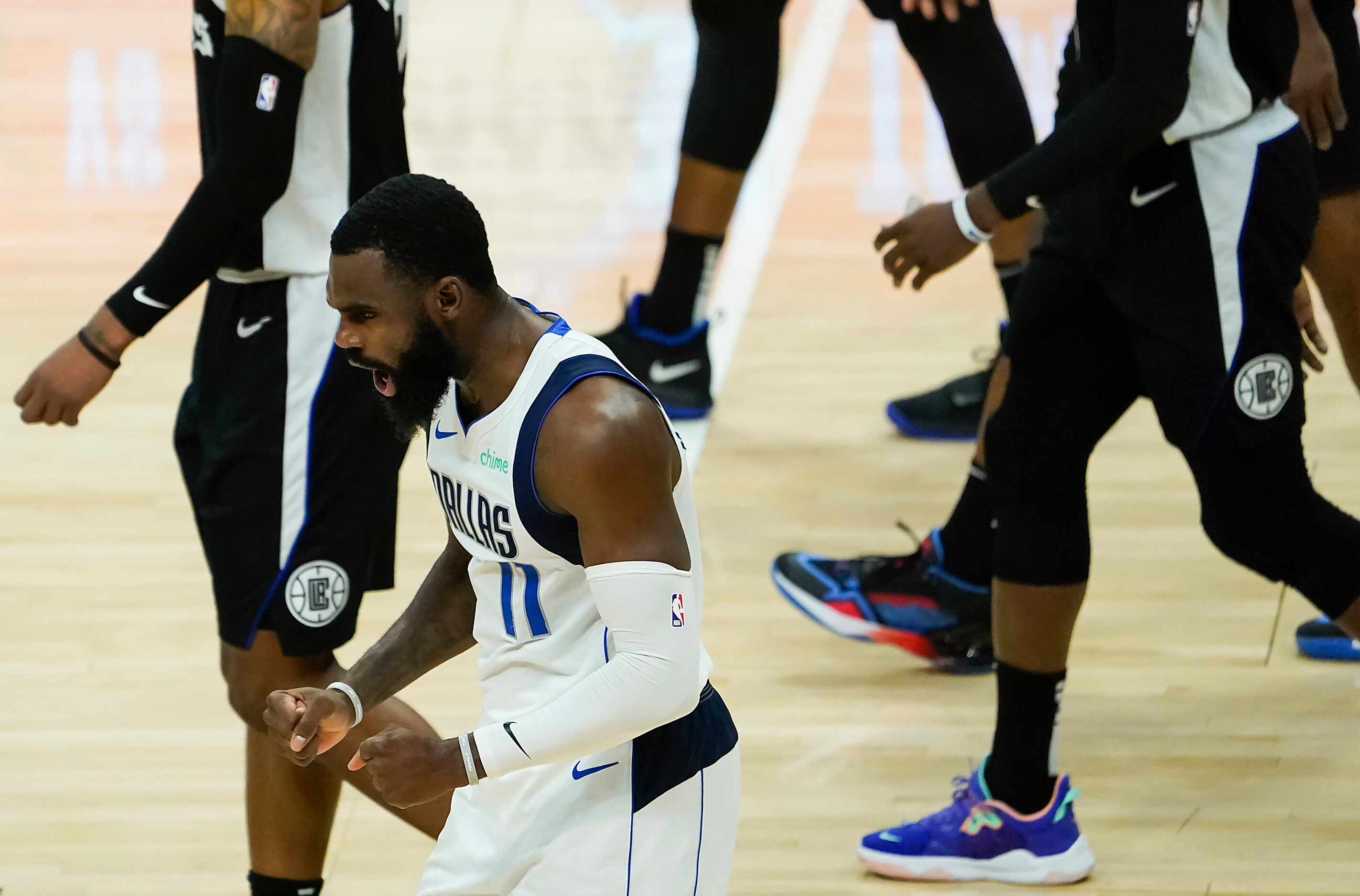 Dallas Mavericks forward Tim Hardaway Jr. (11) celebrates after LA Clippers forward Kawhi...