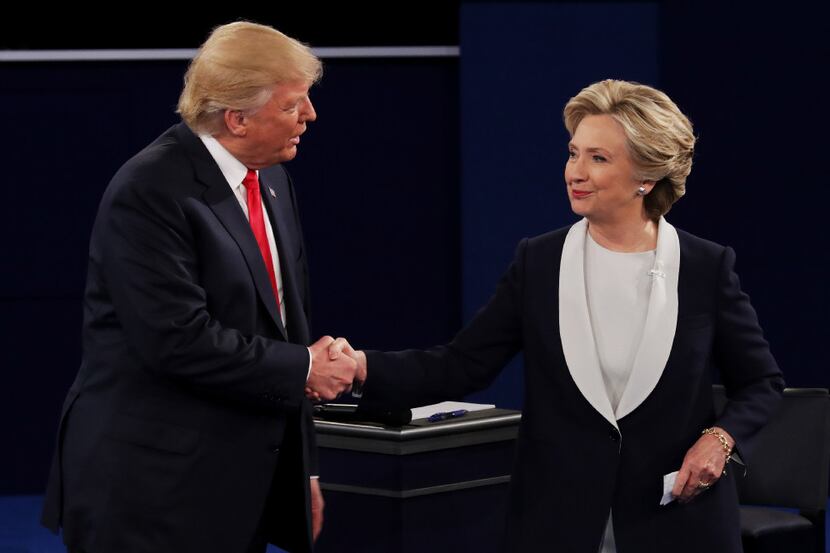 It wasn't until the end, but Donald Trump and Hillary Clinton finally shook hands at Sunday...