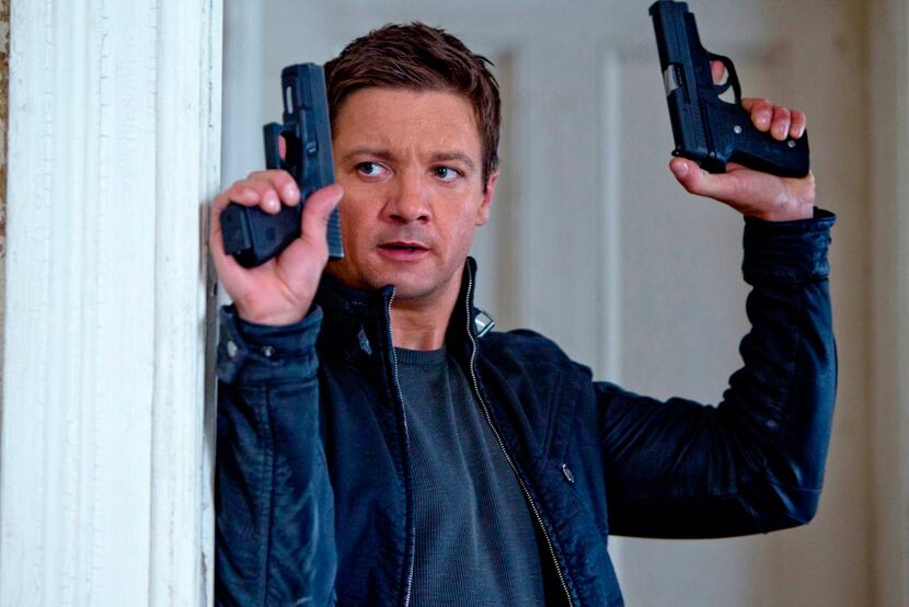 This publicity film image released by Universal Pictures shows Jeremy Renner, as Aaron...