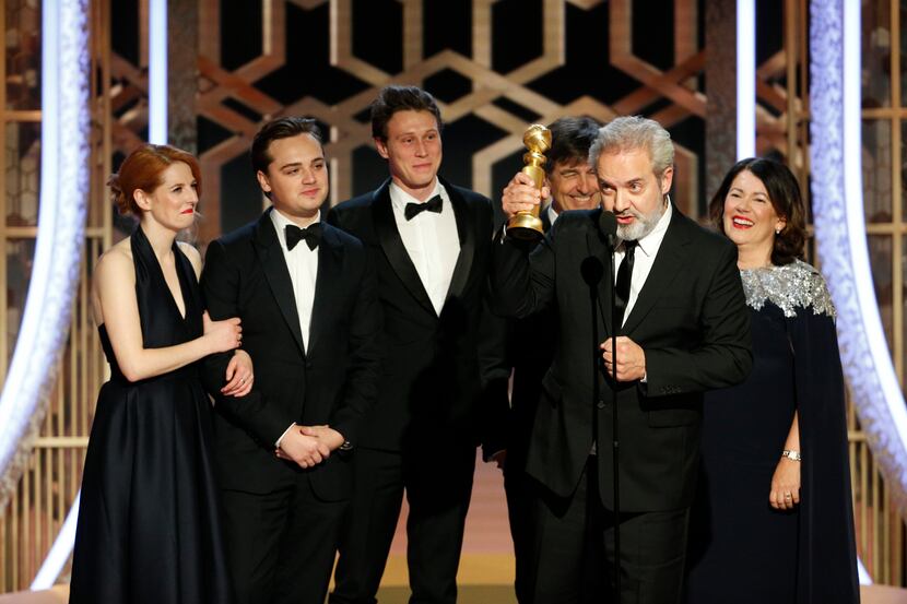 This image released by NBC shows filmmaker Sam Mendes accepting the award for best motion...