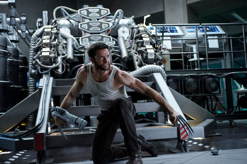This publicity image released by 20th Century Fox shows Hugh Jackman in a scene from "The...