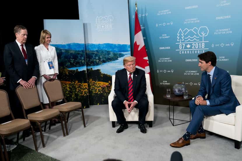FILE -- President Donald Trump and Prime Minister Justin Trudeau of Canada at the G-7 summit...