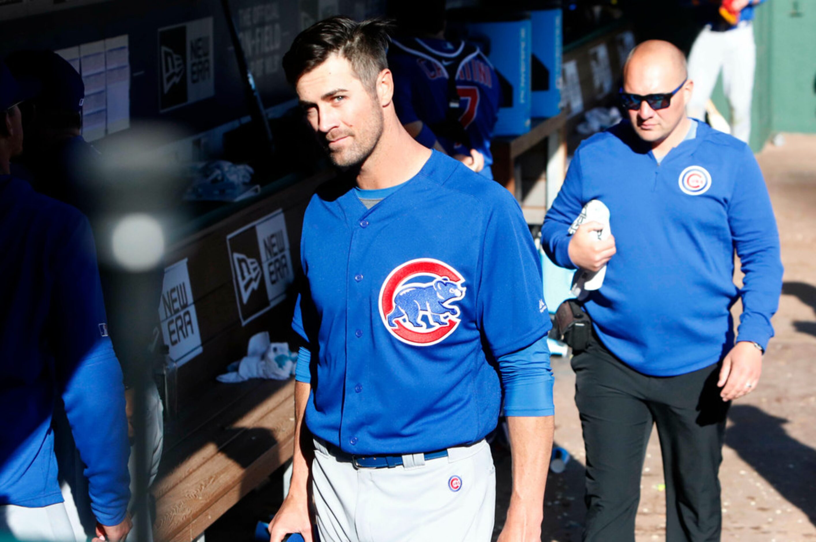 Chicago Cubs starting pitcher Cole Hamels leaves the dugout after pitching against the Texas...