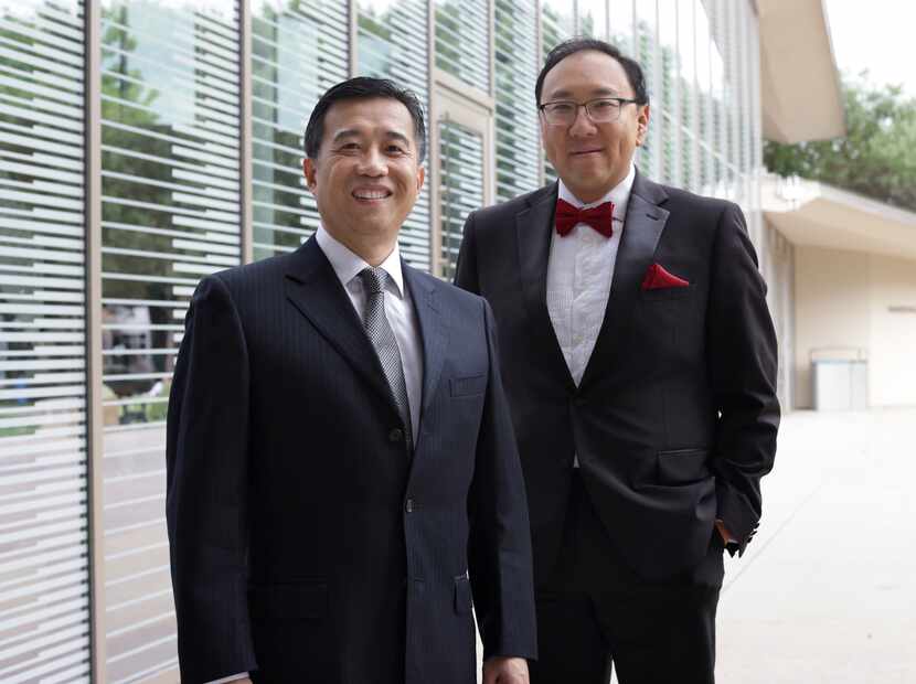 CY Chen, left, and James Huang, who helped found the NiHao Food Bank Initiative, pose for a...