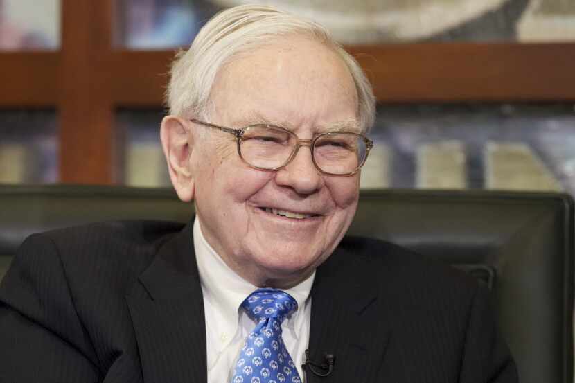FILE - In this May 6, 2013 file photo, Warren Buffett smiles during a television interview...