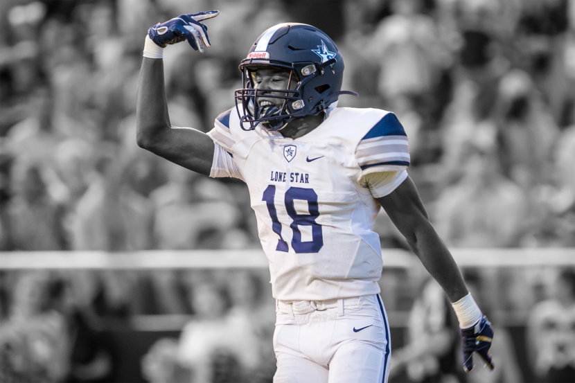 Frisco Lone Star wide receiver Marvin Mims celebrates after scoring on a touchdown reception...