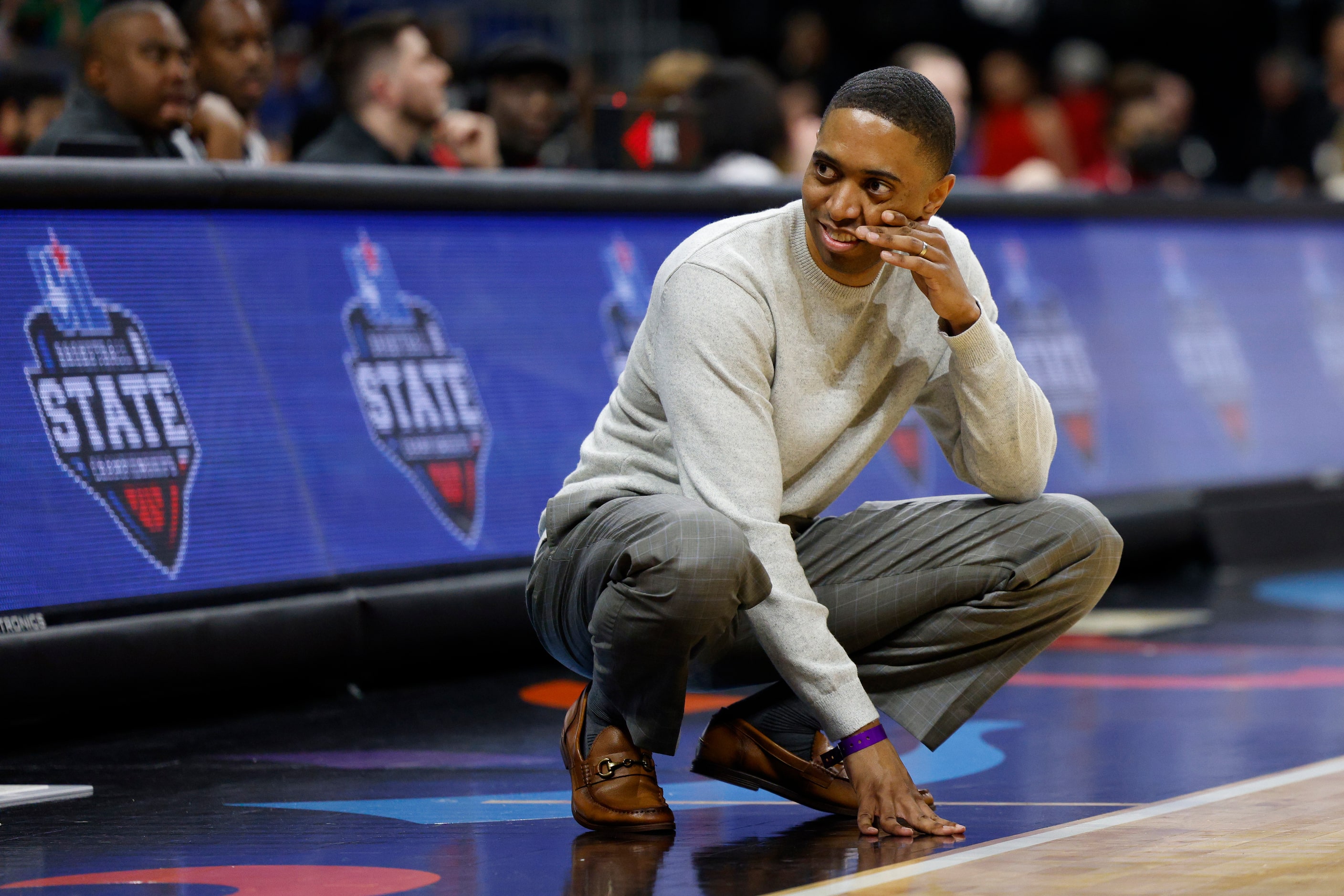 South Grand Prairie head coach Brion Raven reacts after a called foul during the third...