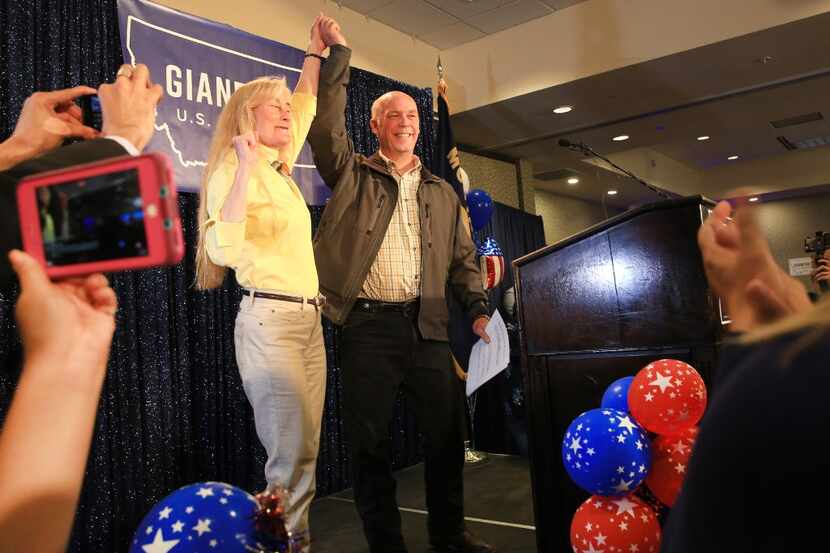 Republican Greg Gianforte celebrates with supporters after being declared the winner at a...