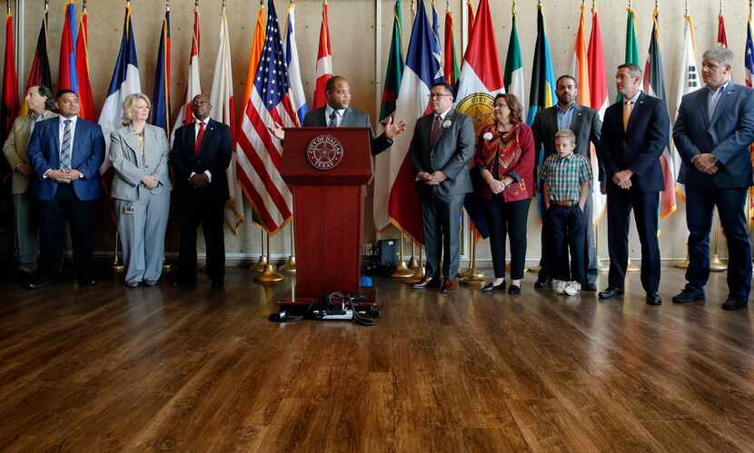 The Dallas City Council along with Mayor Eric Johnson (at podium) passed a budget largely...