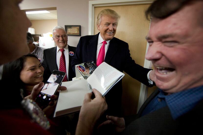 Republican presidential candidate Donald Trump visits a campaign office Tuesday, Feb. 2,...