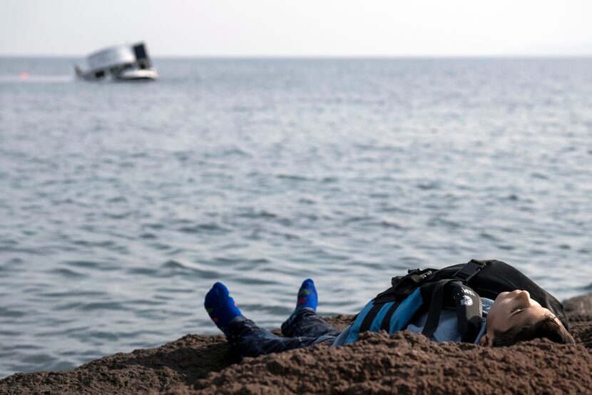 The dead body of a migrant boy lies on the beach near the Aegean town of Ayvacik, Canakkale,...