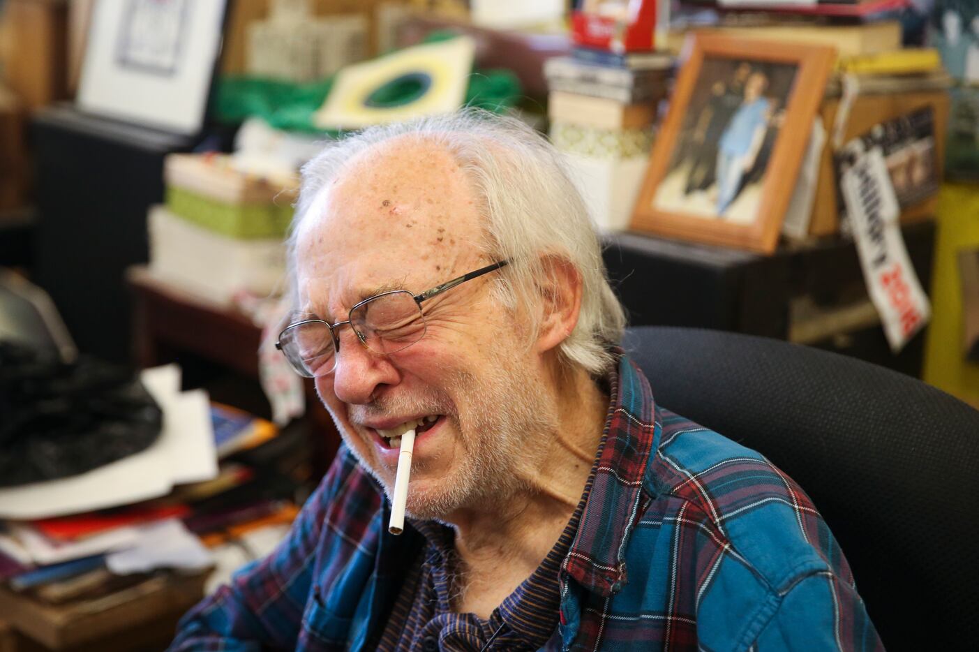 Bill Wisener smokes a cigarette Friday, Nov. 30, 2018 at his store, Bill's Records, in Dallas. 