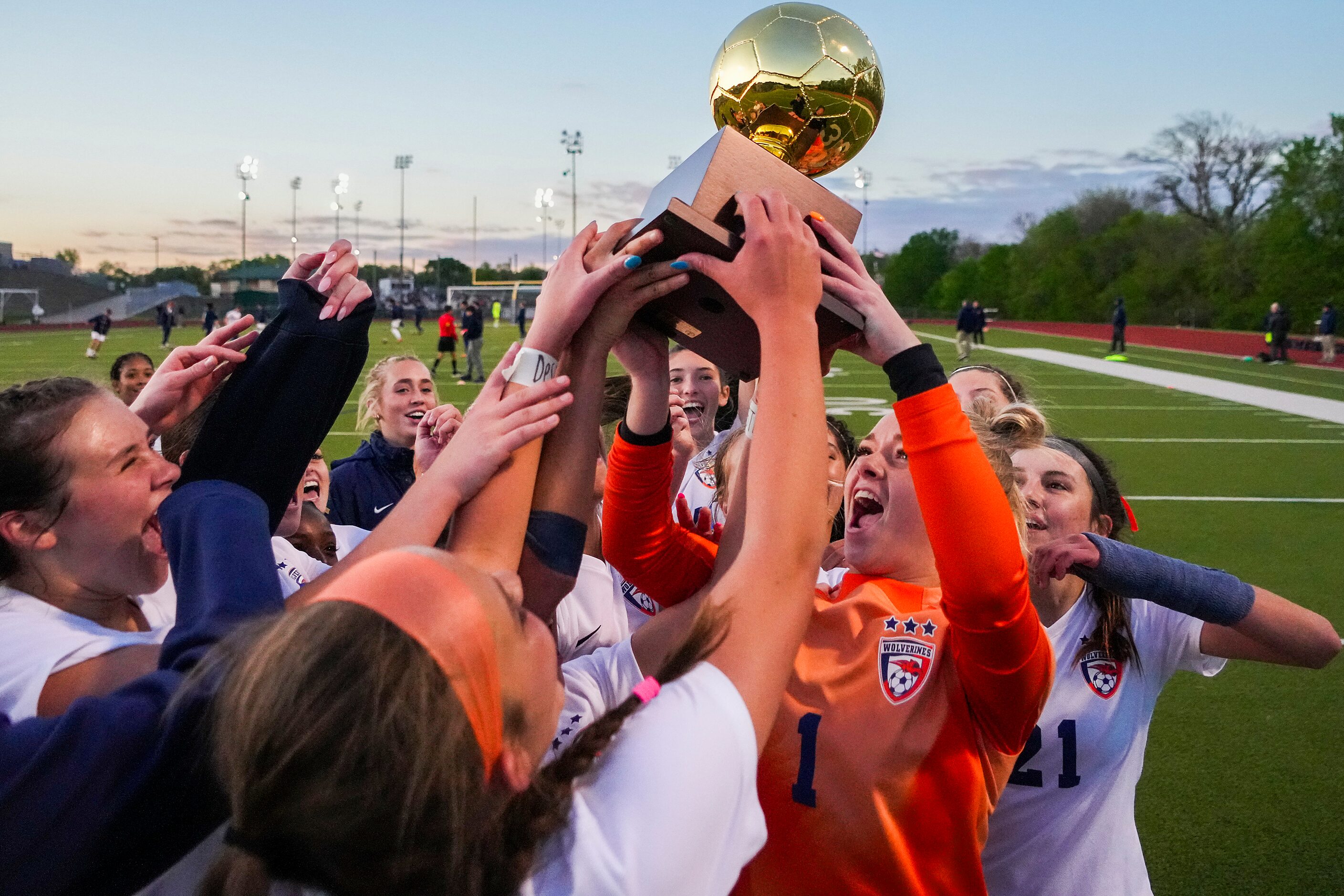 Frisco Wakeland goalkeeper Brooklynn Freeman (1) lifts the game trophy with teammates after...