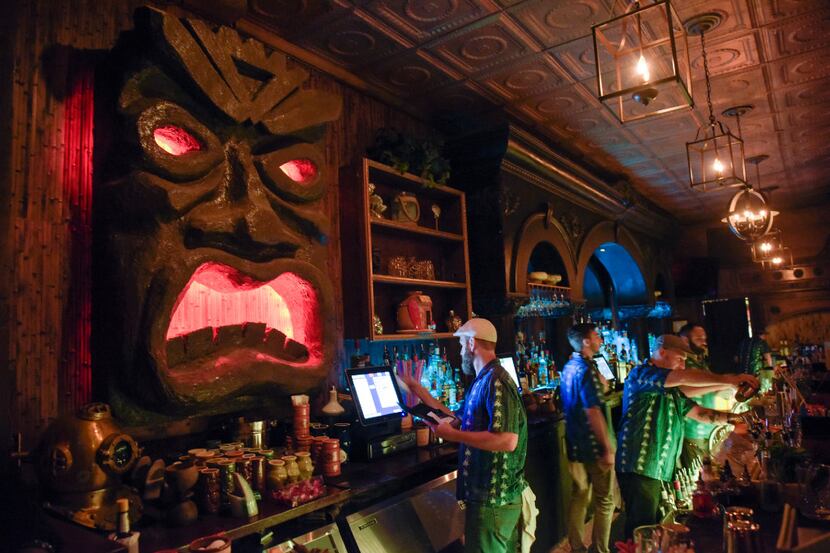Bartenders at Pilikia, a tiki bar on Ross Ave., open in the former Three Sheets location...