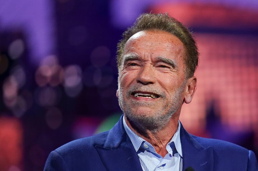Arnold Schwarzenegger talks during a pre-show BMW keynote at CES 2023, Jan. 4, 2023, in Las...