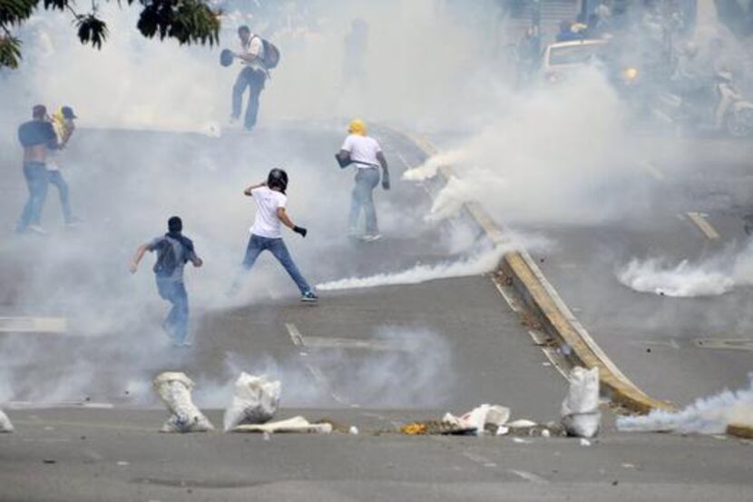 
Demonstrators clash with the riot police during an anti-government protest in eastern...