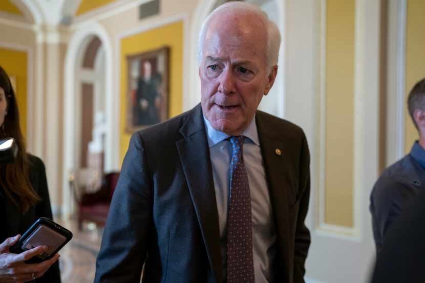 Sen. John Cornyn, R-Texas, speaks to reporters at the Capitol in Washington, Tuesday, Sept....