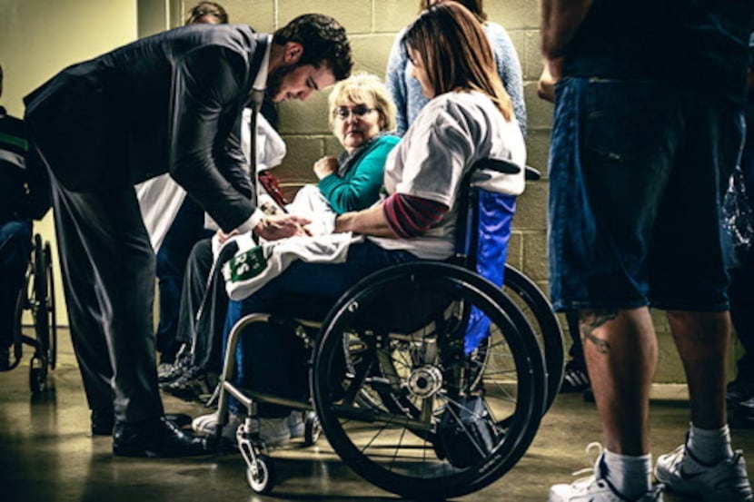 Dallas Stars Tyler Seguin signs an autograph. Tyler started "Seguin's Stars and is partners...