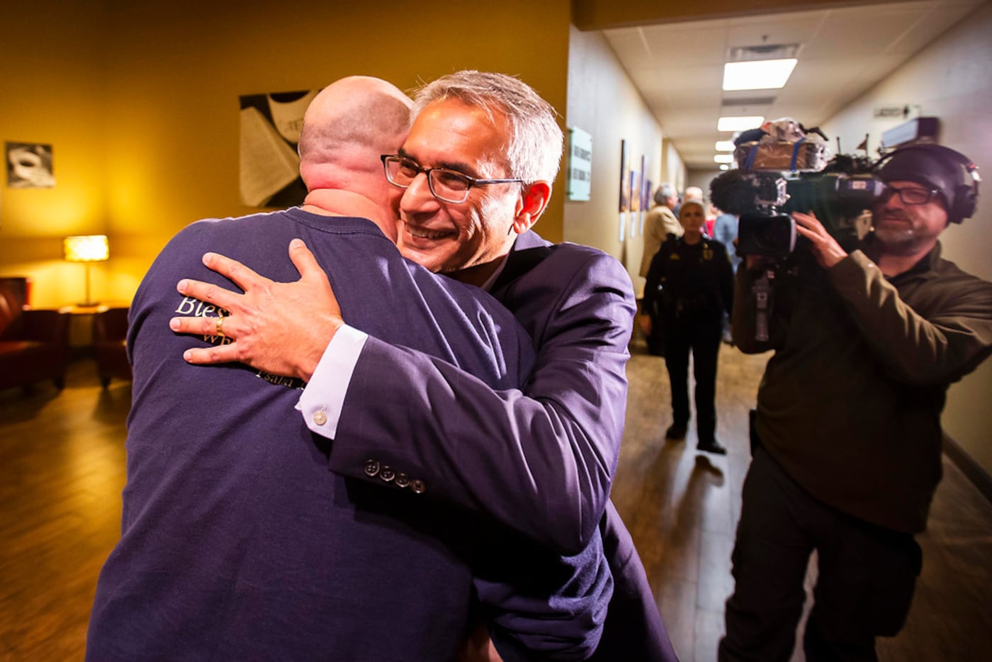 Tarrant County Republican Party  vice chair Dr. Shahid Shafi hugs a supporter after a...