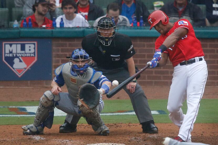 Texas Rangers third baseman Adrian Beltre (29) hits a fly ball during the Toronto Blue Jays...