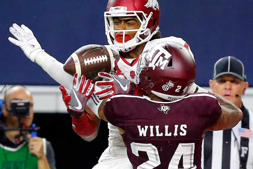Texas A&M Aggies defensive back Priest Willis (24) breaks up a goal line pass of Arkansas...