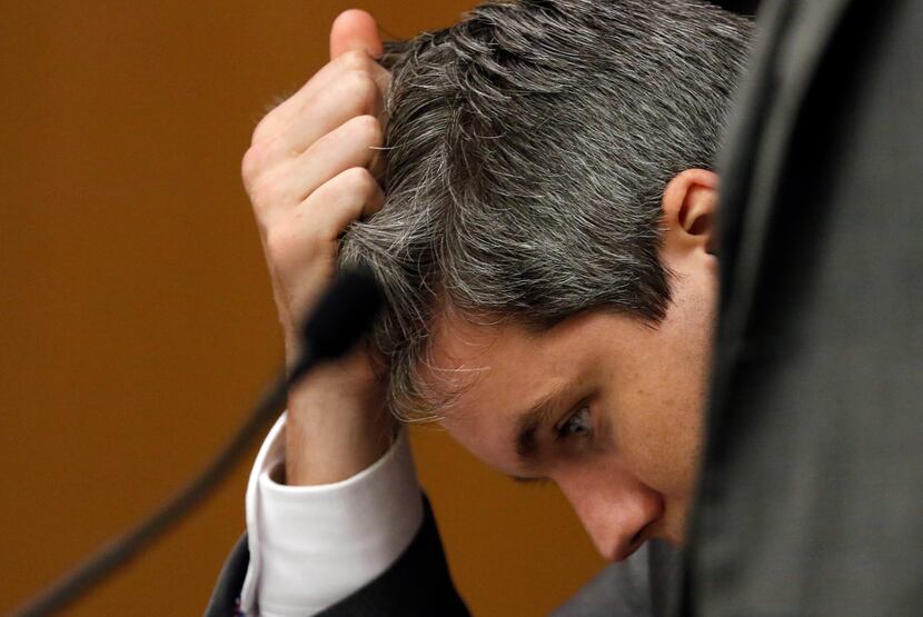 Defendant Jason Lowe pulls his hair after being sentenced Wednesday to 50 years in prison...