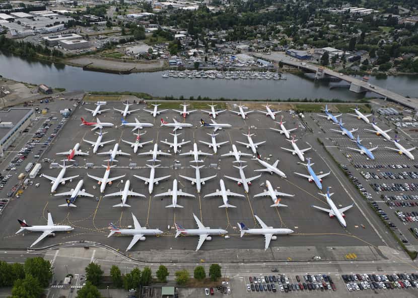 SEATTLE, WA - JUNE 27: Boeing 737 MAX airplanes are stored on employee parking lots near...