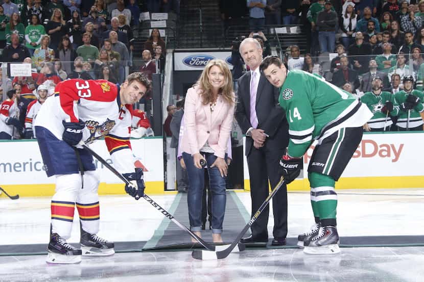 The puck drop at Fight Cancer Night on Oct. 24, 2015 DALLAS, TX - OCTOBER 24: Dallas Stars...