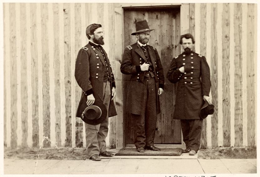 Gen. U.S. Grant (center) with John Rawlins (left) and an unidentified officer. Rawlins was...
