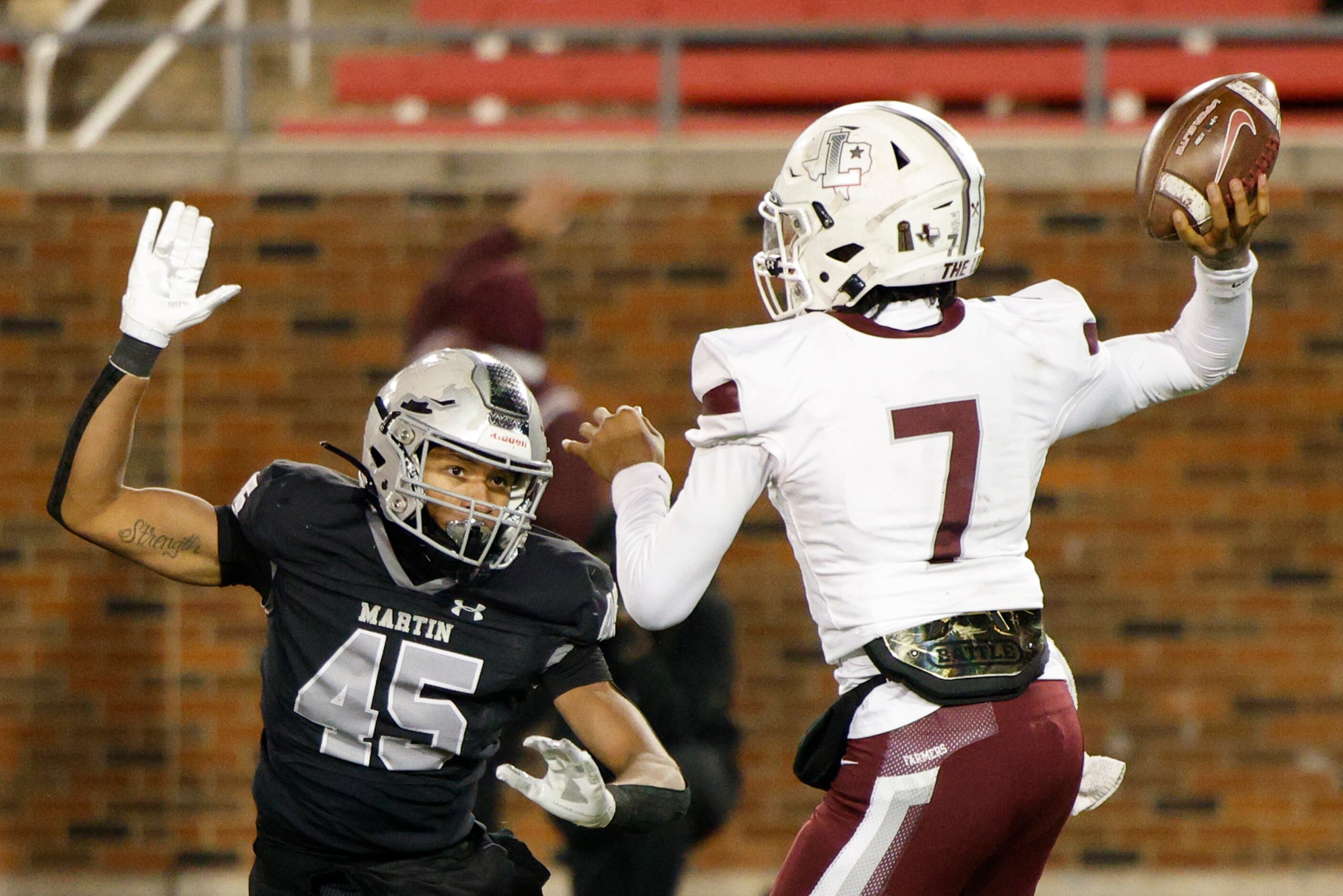 Lewisville quarterback Ethan Terrell (7) throws a pass while under pressure from Arlington...