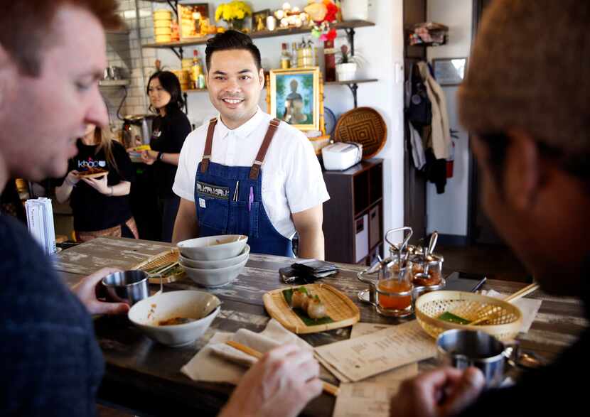 Chef and owner Donny Sirisavath visits with diners at Khao Noodle Shop, which was named the...