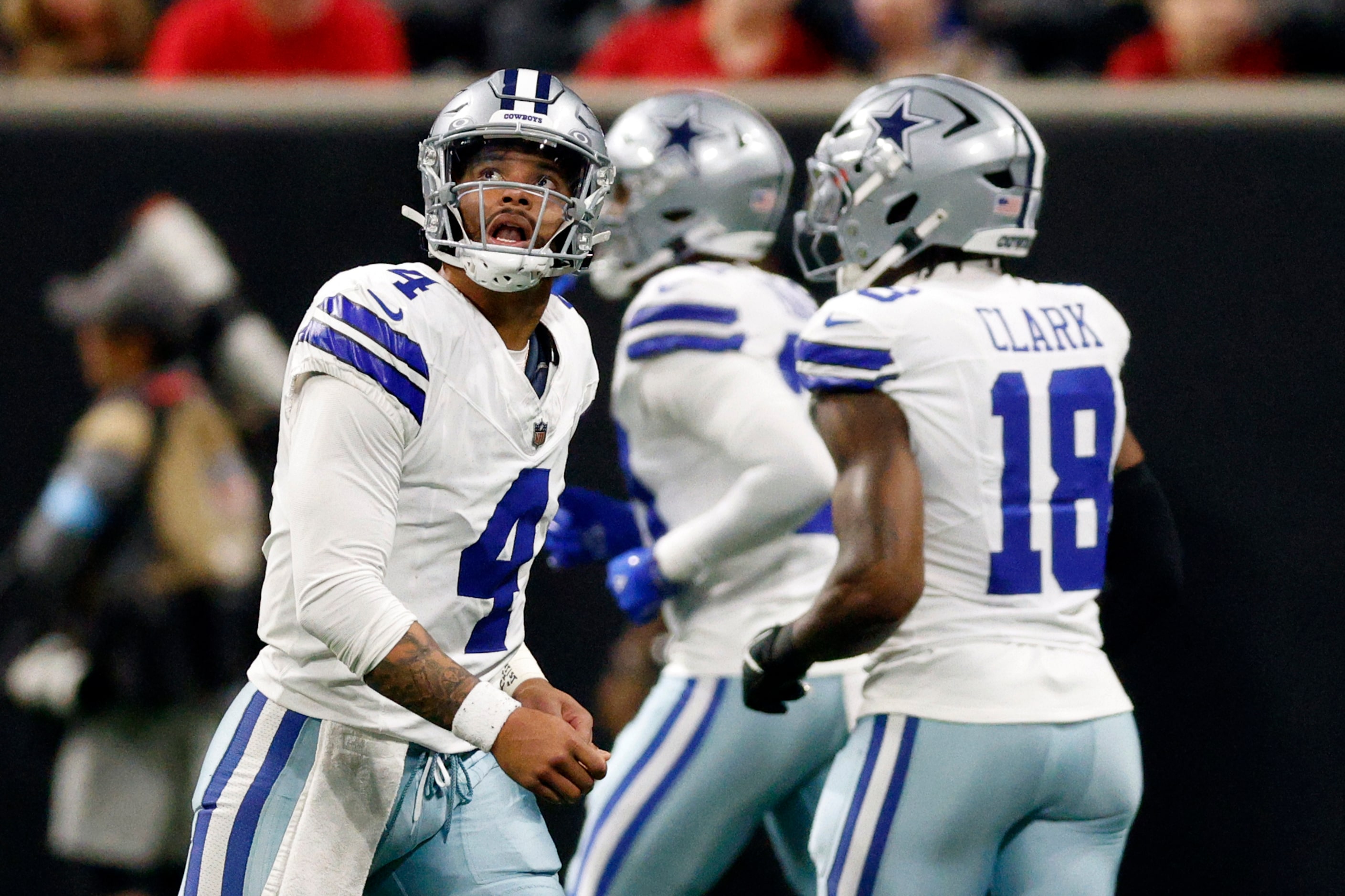 Dallas Cowboys quarterback Dak Prescott (4) jogs off the field after getting sacked on...