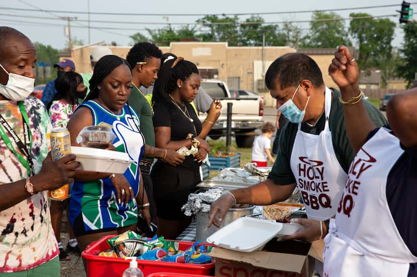Visitors were able to choose from a variety of food vendors, such as Holy Smoke BBQ, at the...