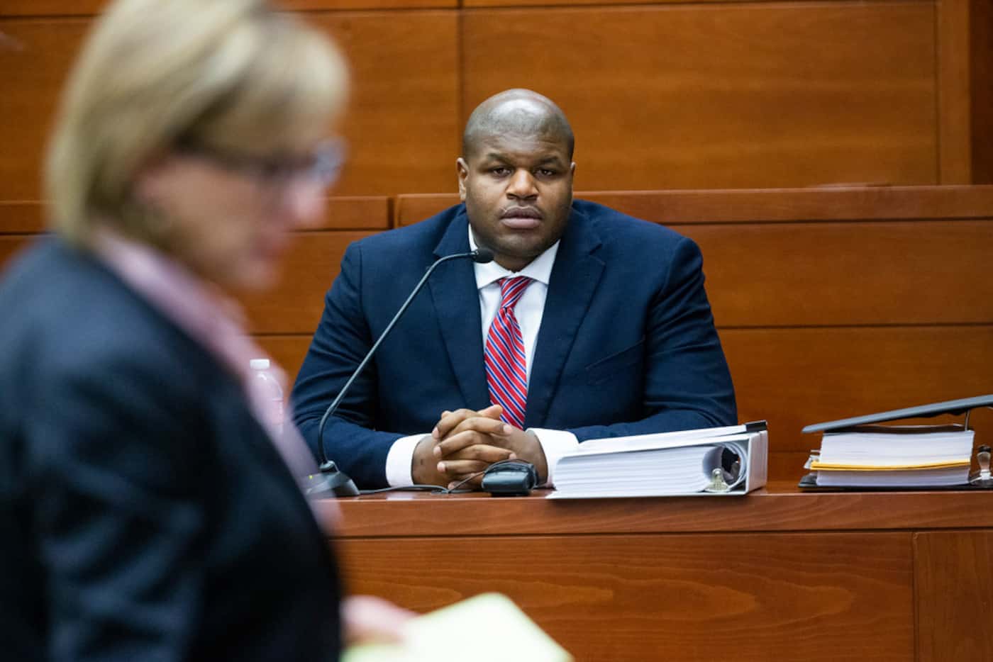 Josh Brent answers questions from Stacey Jackson's lawyer, Charla Aldous, at George Allen...