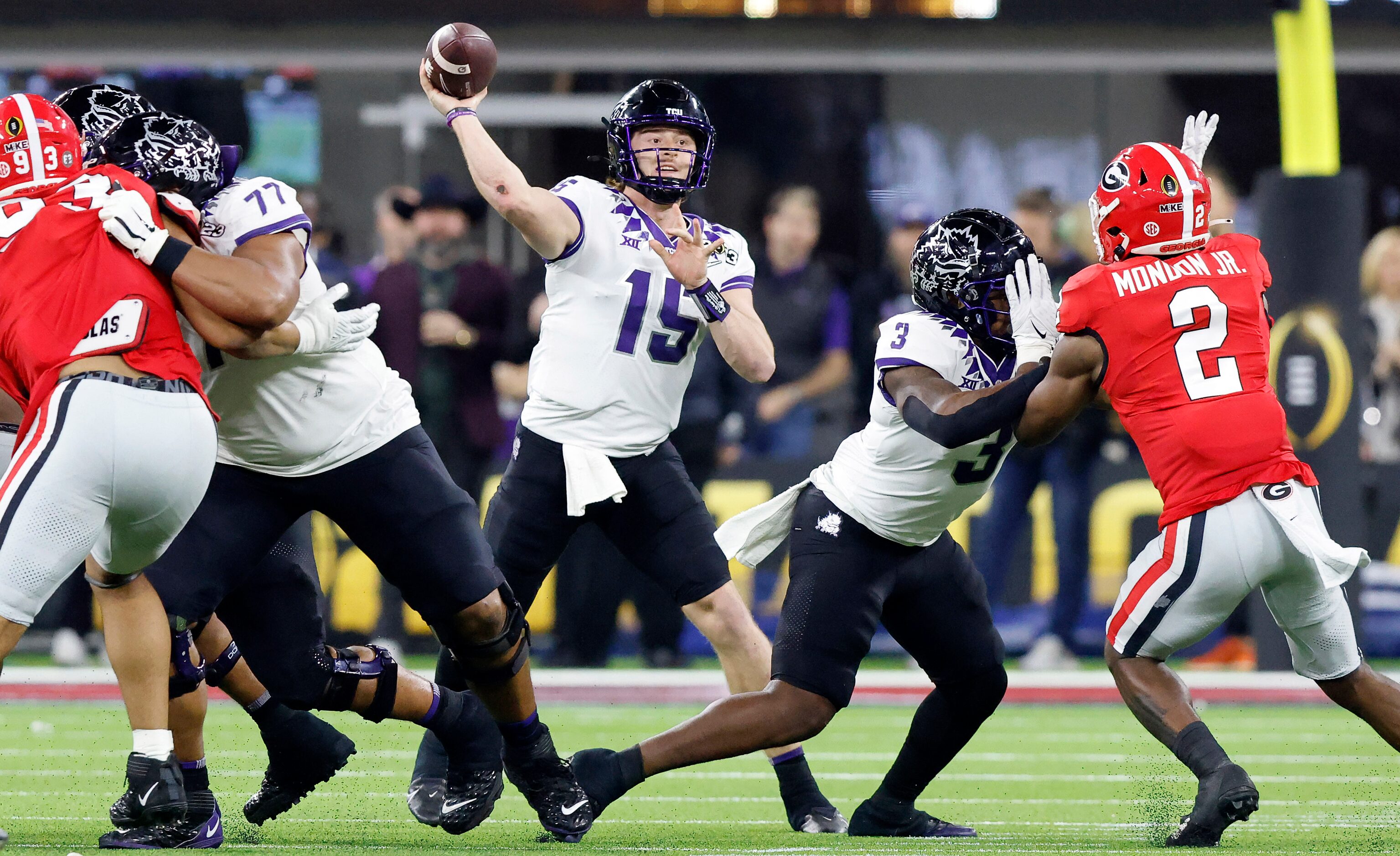 TCU Horned Frogs quarterback Max Duggan (15) throws a first quarter pass against the Georgia...