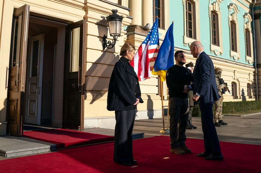 President Joe Biden shook hands with Ukrainian President Volodymyr Zelenskyy along with...