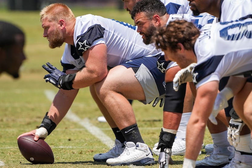 Dallas Cowboys center Tyler Biadasz (63) prepares for a snap during a practice at training...