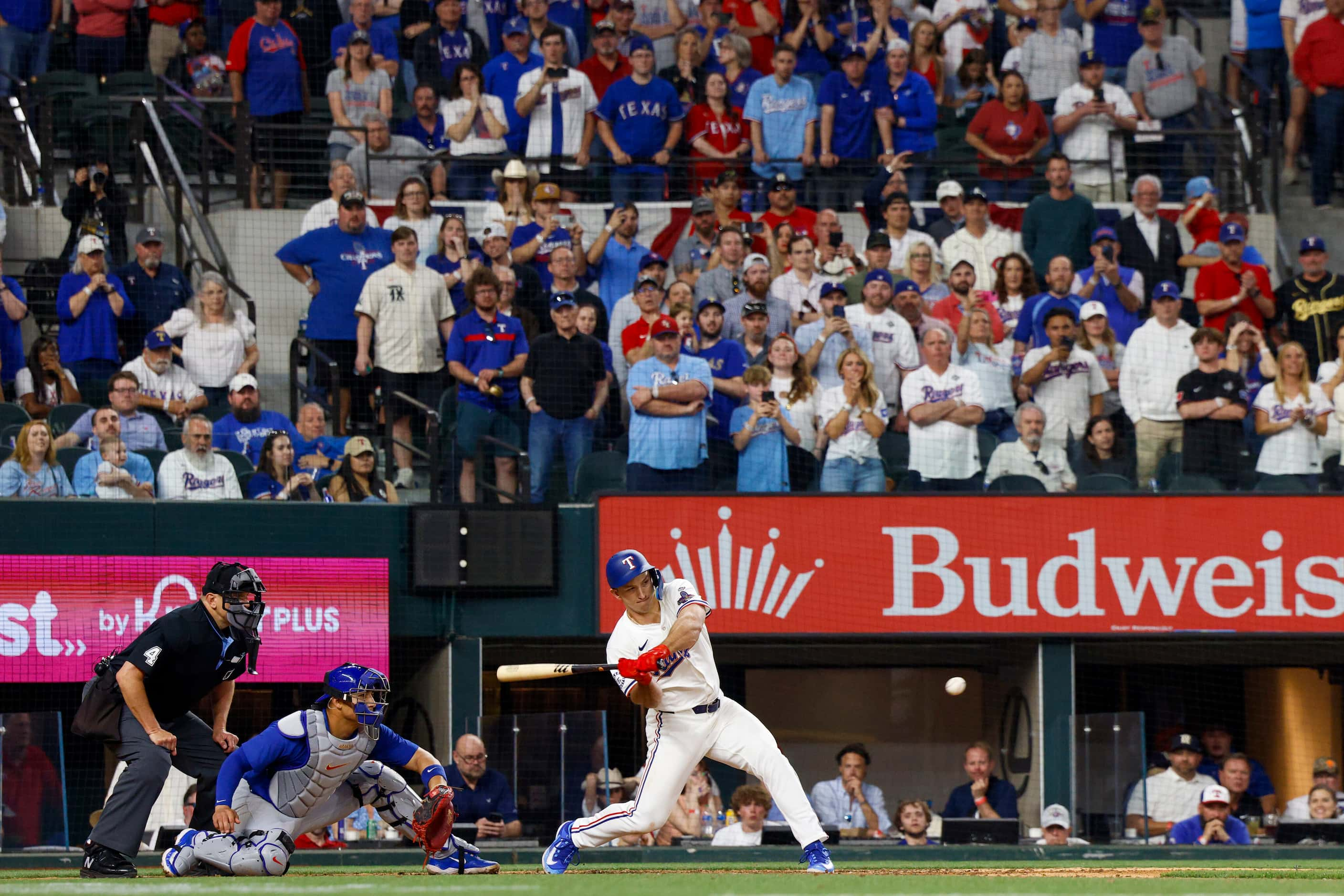 Texas Rangers designated hitter Wyatt Langford (36) swings at a pitch during the 10th inning...