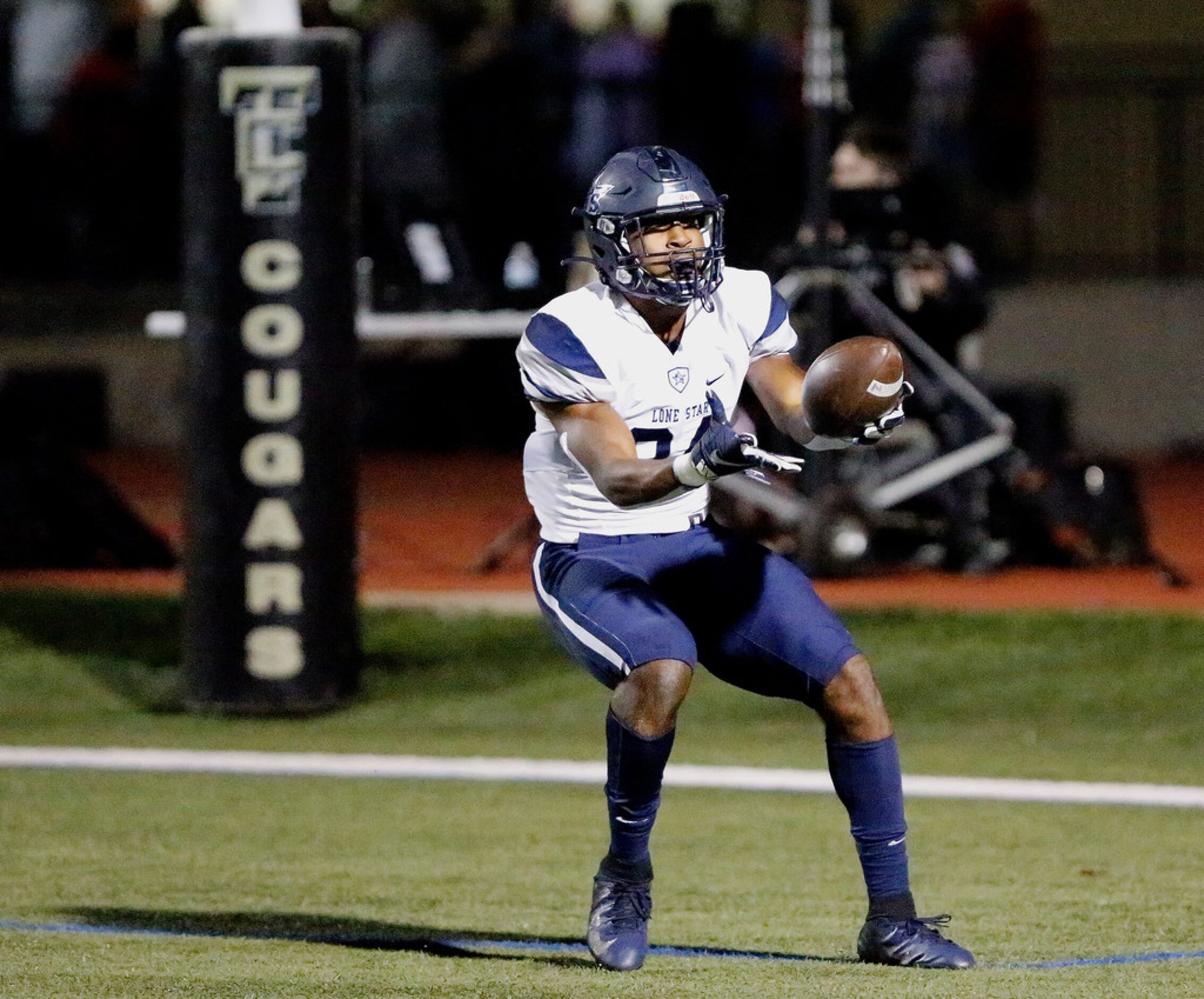 Lone Star High School linebacker Jaylan Ford (24) reacts after he thought he had taken...