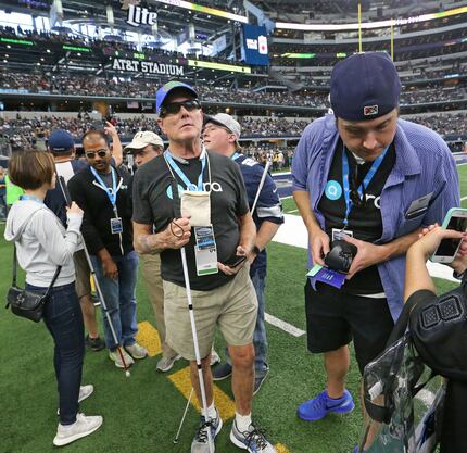 Pete Lane visits the sidelines at AT&T Stadium.