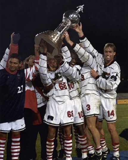 The Dallas Burn lift the 1997 US Open Cup.