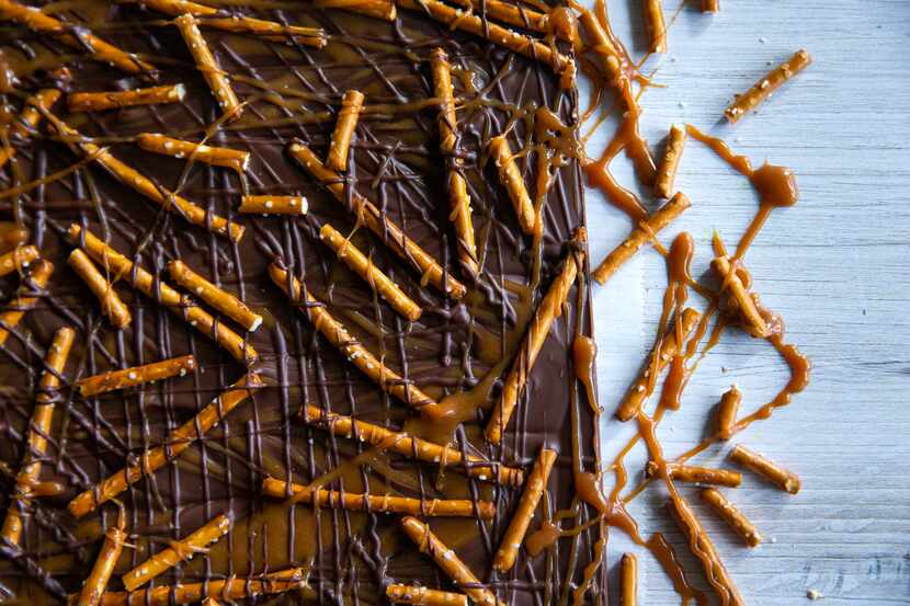 A slab of pretzel caramel chocolate bark is photographed at Kristen Massad's home in Dallas...