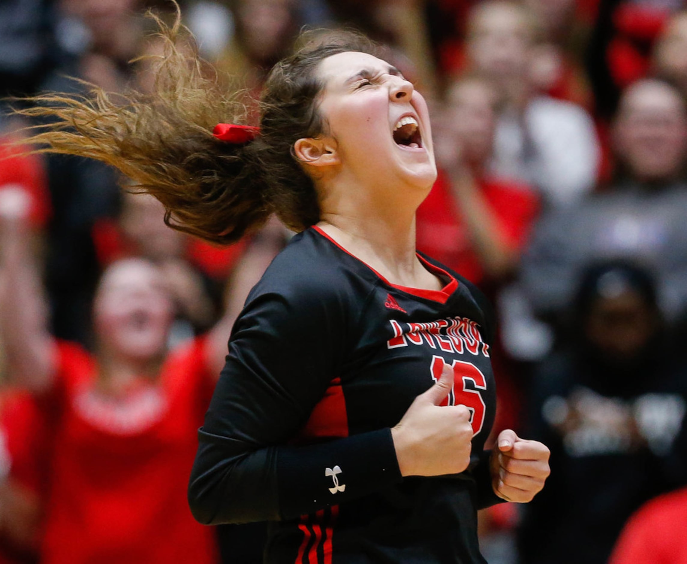 LovejoyÃs Emma Johnson (16) celebrates after scoring against Friendswood in the third set...