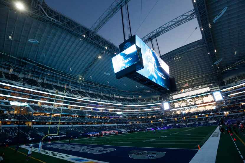 The pregame video plays as the roof is open before a game between the Dallas Cowboys and...