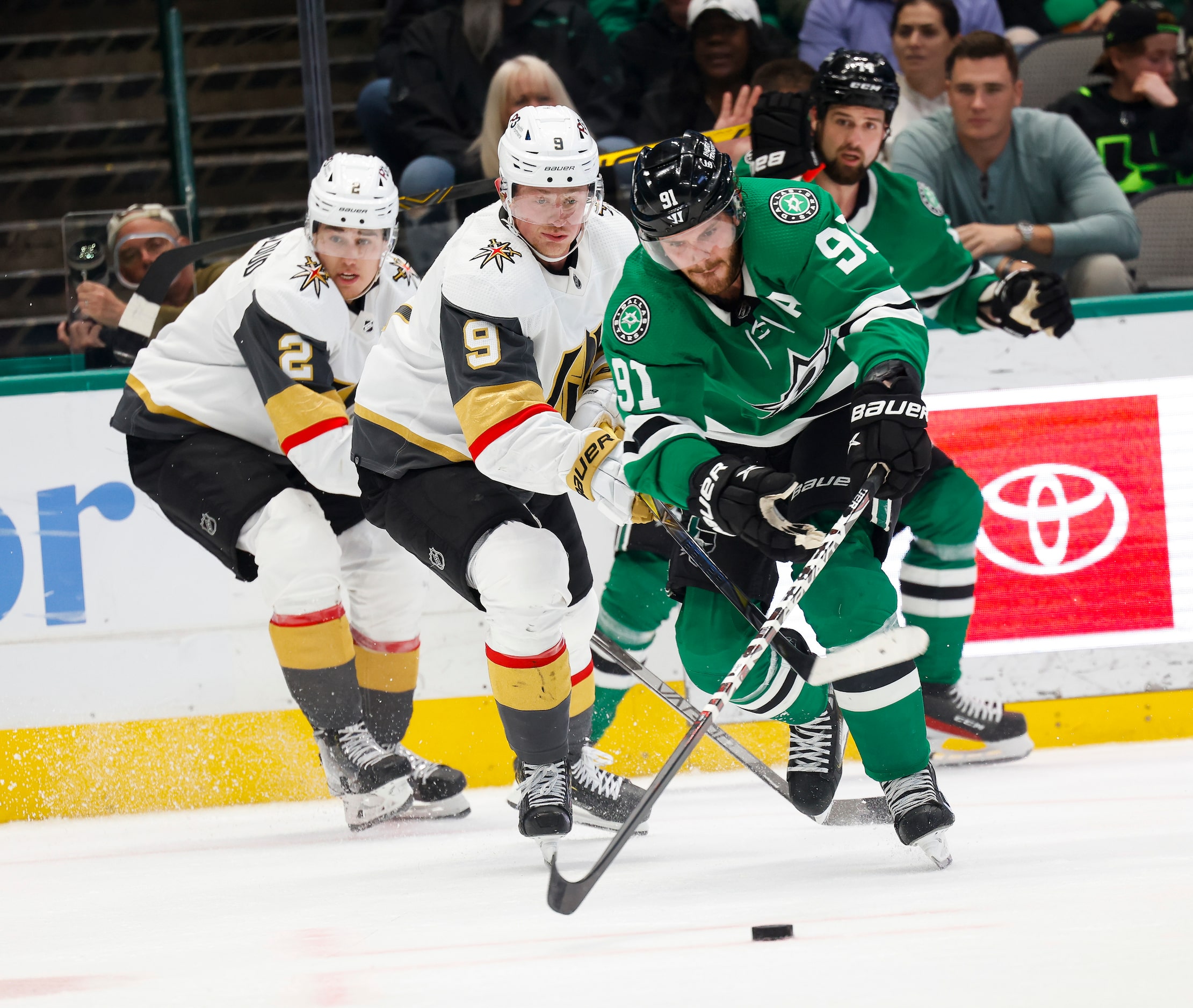 Dallas Stars center Tyler Seguin (91) leads the puck away from Vegas Golden Knights center...