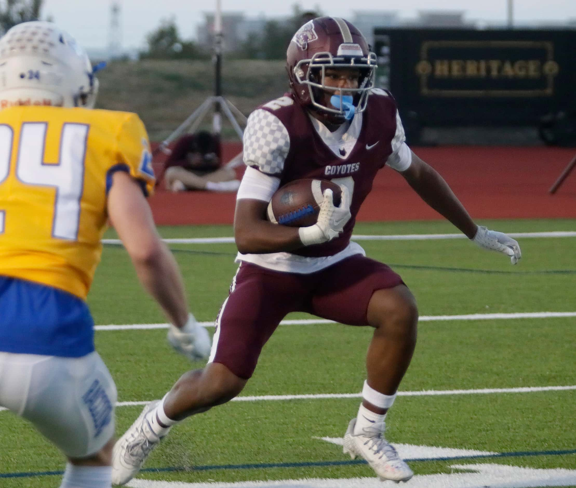 Frisco Heritage High School wide receiver Tatum Bell Jr (2) returns the opening kickoff as...