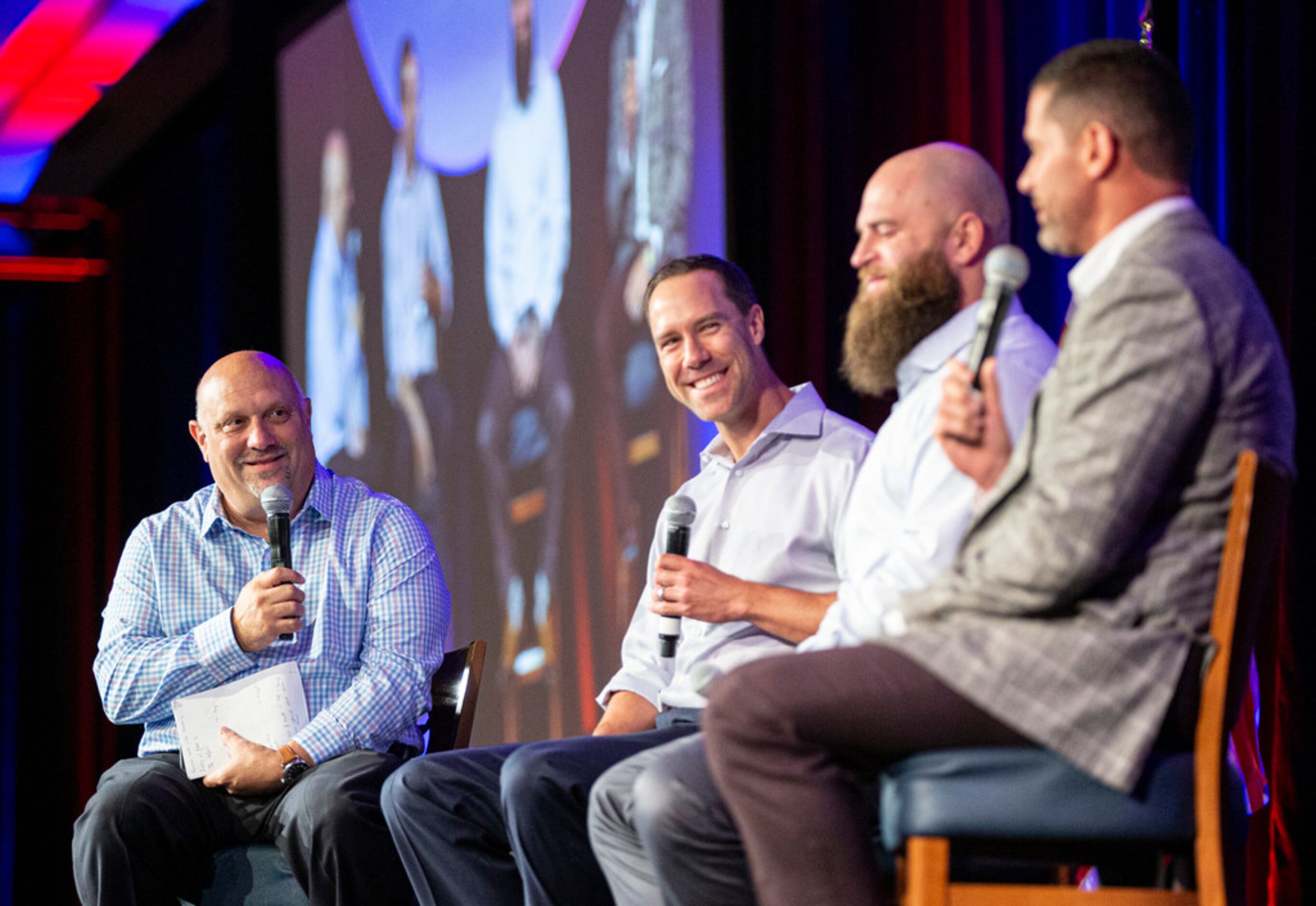 Texas Rangers beat writer Evan Grant, left, asks former players David Murphy, second from...