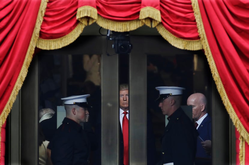 President-elect Donald Trump waits to step out onto the portico for his inauguration at the...