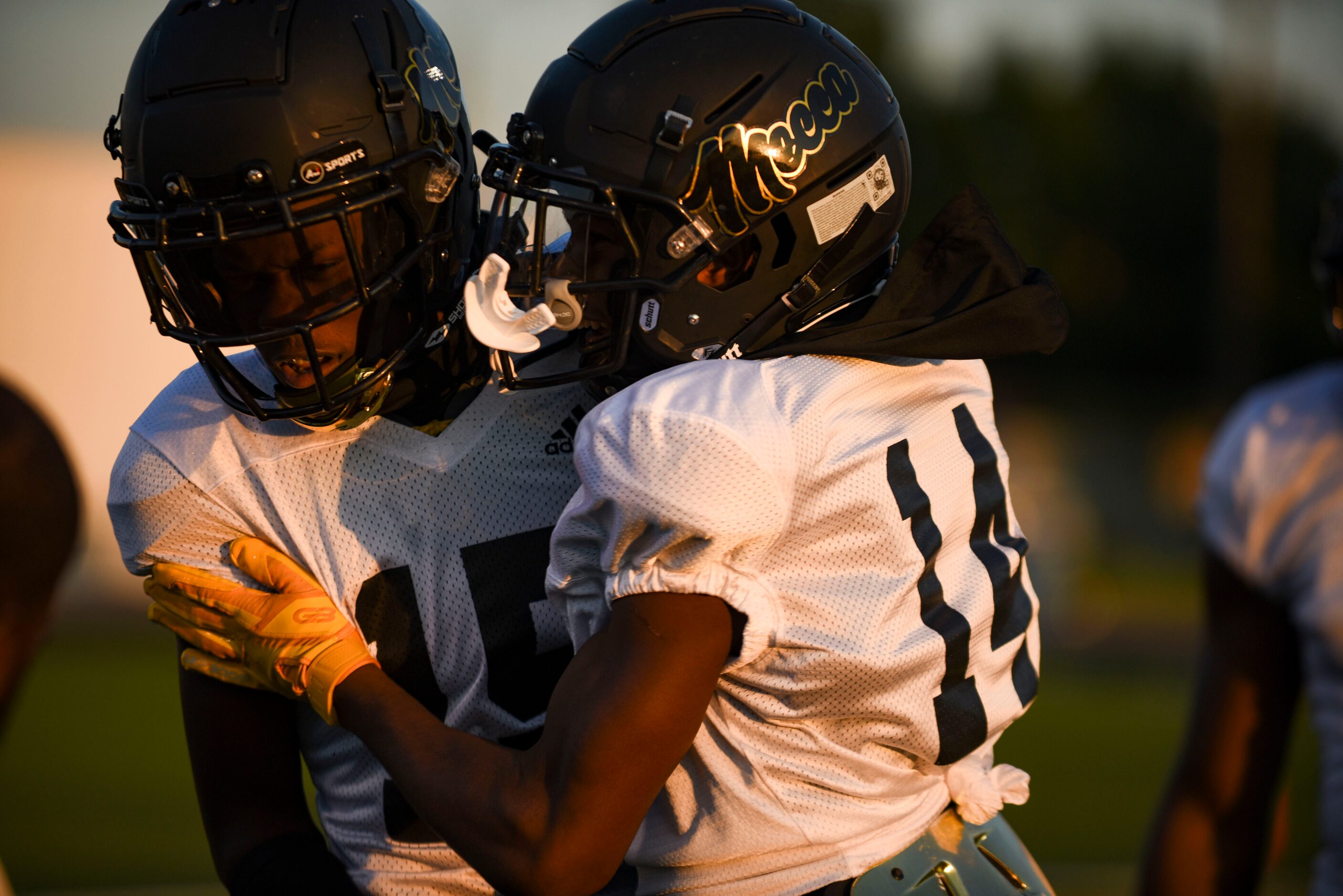 South Oak Cliff senior Corinthean Coleman (14) congratulates South Oak Cliff junior Dave...