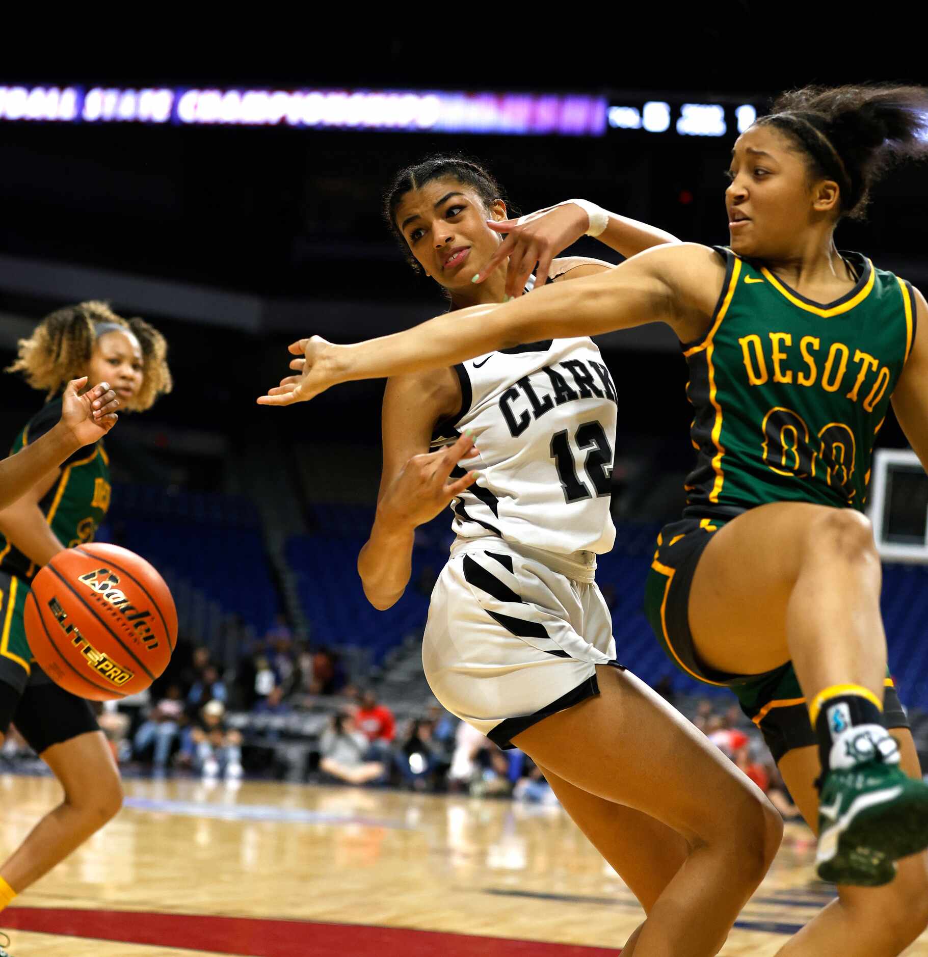 Desoto Mylasia Smith (00) can’t control a loose ball as Clark Cougars’ Adrianna Roberson...